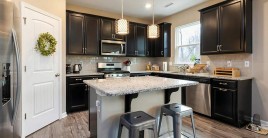How Do Modular Kitchen Manufacturers in Noida Ensure Quality and Timely Delivery
